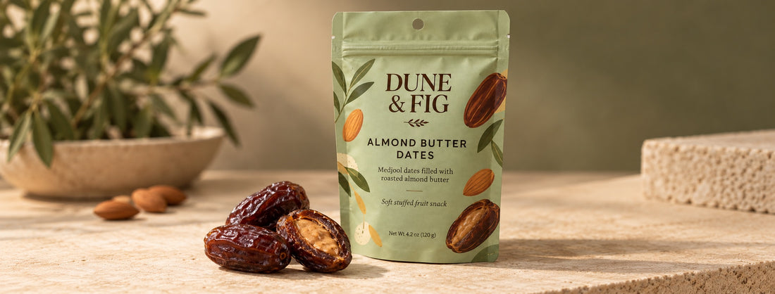 Custom printed snack pouch styled on a stone surface with dates and almonds beside it